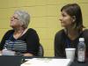 ... as the panelists listen raptly.