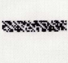 Cody Trepte, Binary cross-stitch of “Can technology be understood outside of itself?” Fabric, 2006